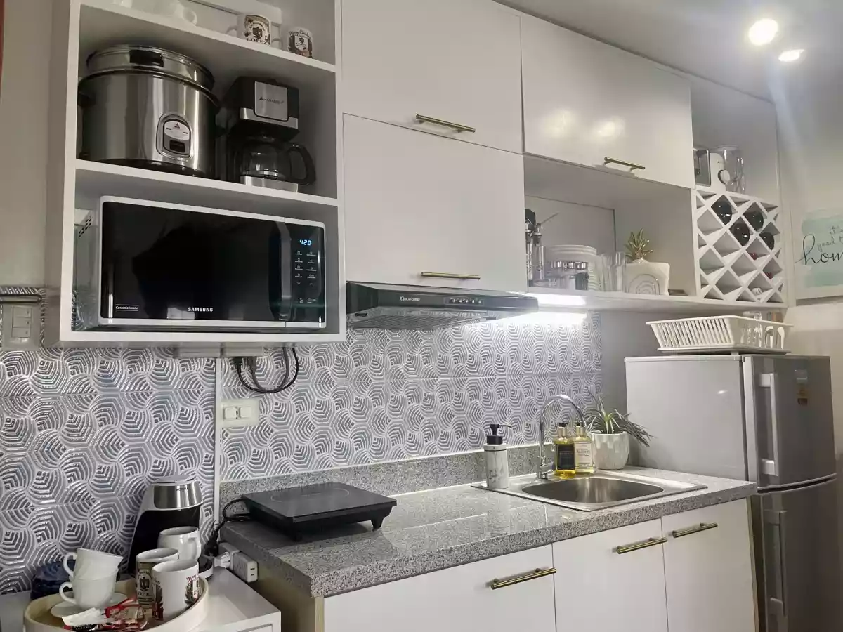 Open photo 13 of 25 — Unbeatable Investment Opportunity! This Airbnb-ready, 1-bedroom condominium unit in Bacolod's Mesavirre Garden Residences is fully furnished and ready to generate rental income