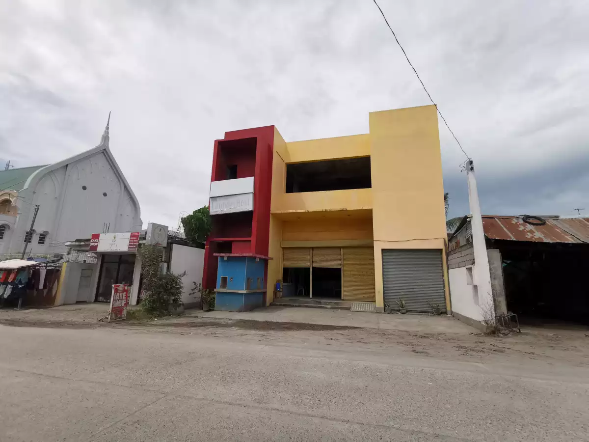 Commercial Building , two storey. Existing Water Refilling and Laundry Services. 192 sq. front Lot area & 180 sq. m - lot at the back.