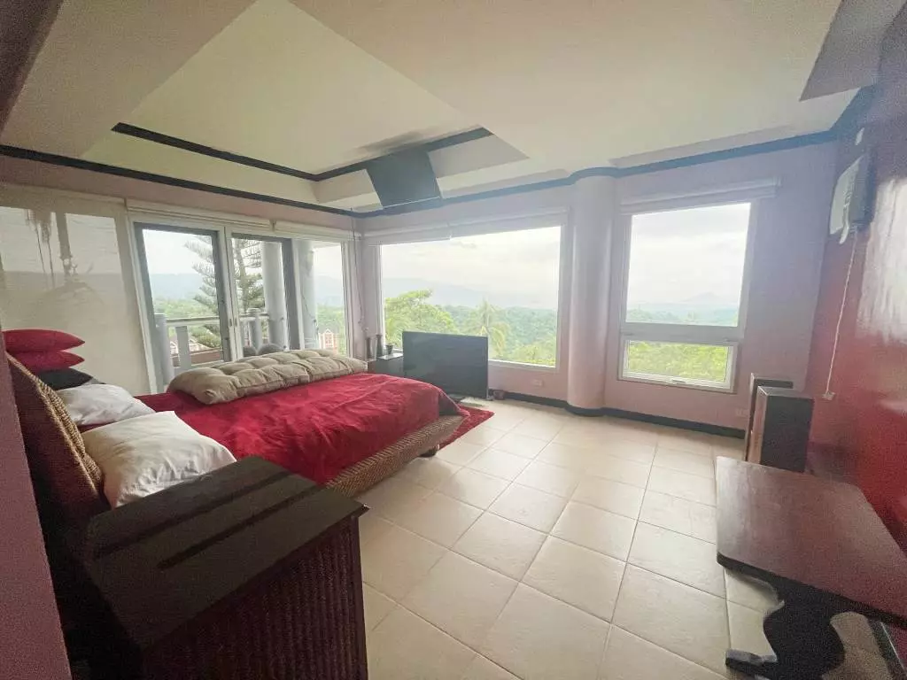 Open photo 21 of 21 — Impressive Taal View House and Lot for sale in Canyon Woods, Tagaytay!