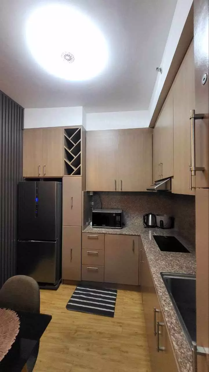 TOP FLOOR FULLY FURNISHED 1-BEDROOM CONDO IN DOWNTOWN CDO