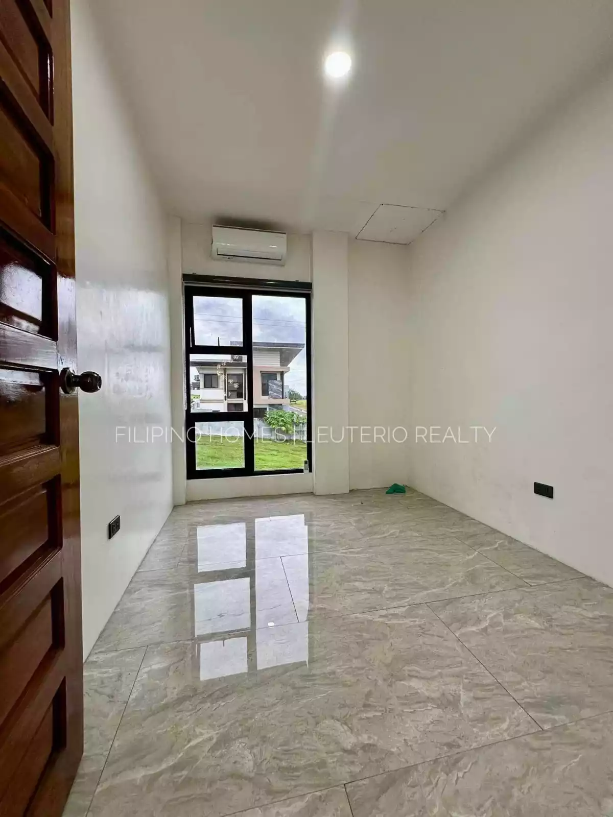 House and Lot For Sale — House and Lot in 1, Bunawan, Davao City — Photo 2