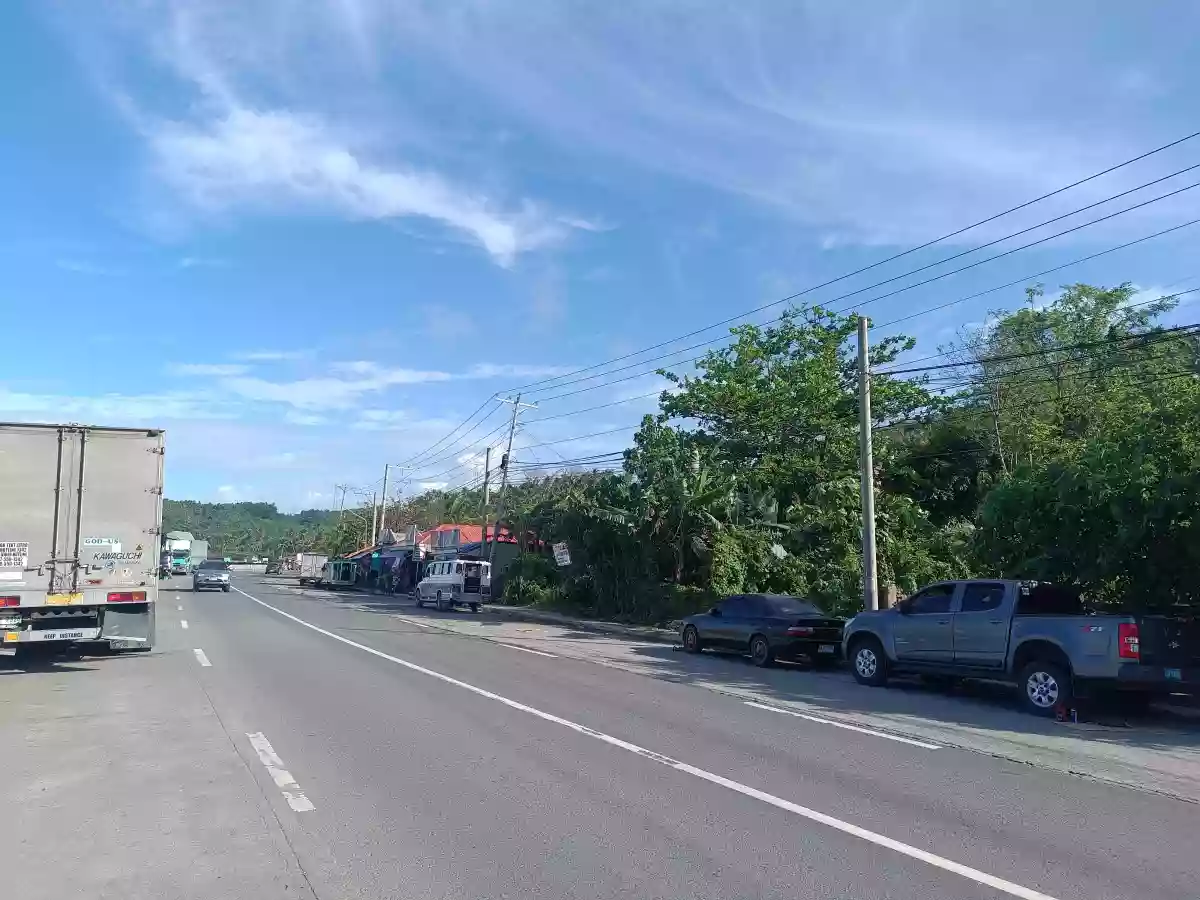 Residential Lot For Sale, along National highway Located in Calumanguin Gumaca Quezon 