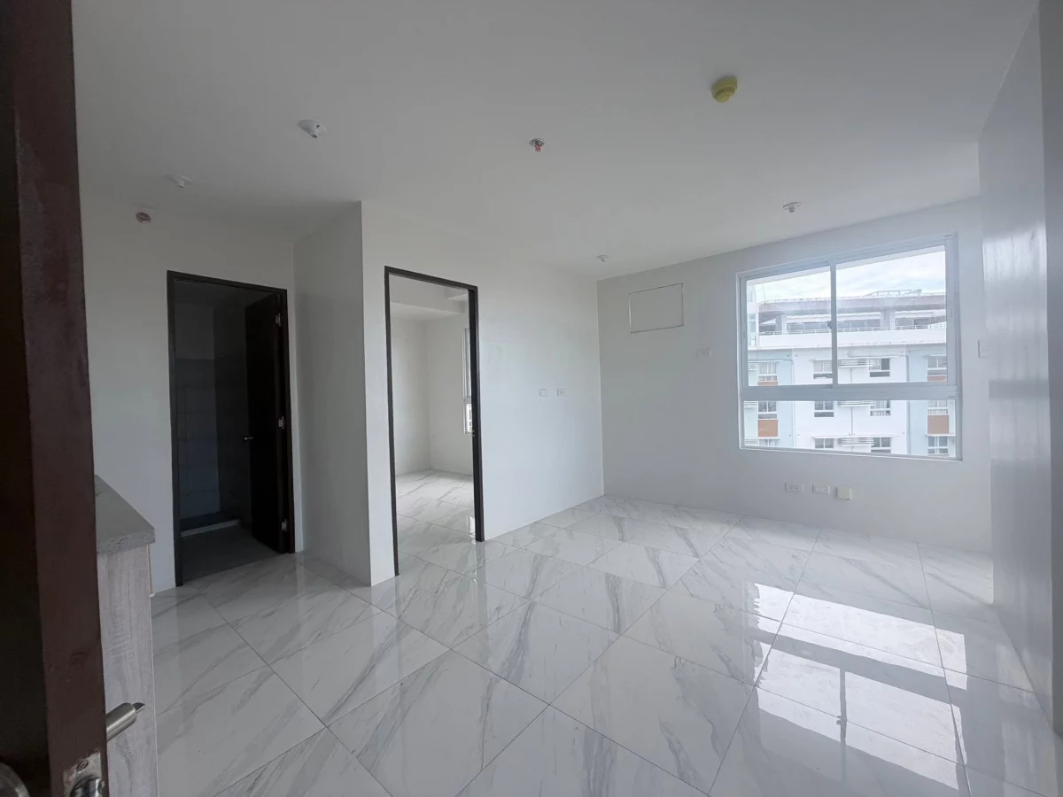 SACRIFICE SALE – Brand New 1BR Corner Unit with Balcony