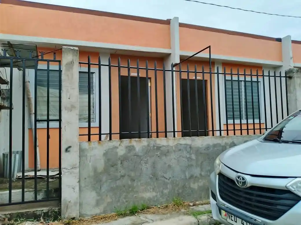 A gated and fenced a house and lot