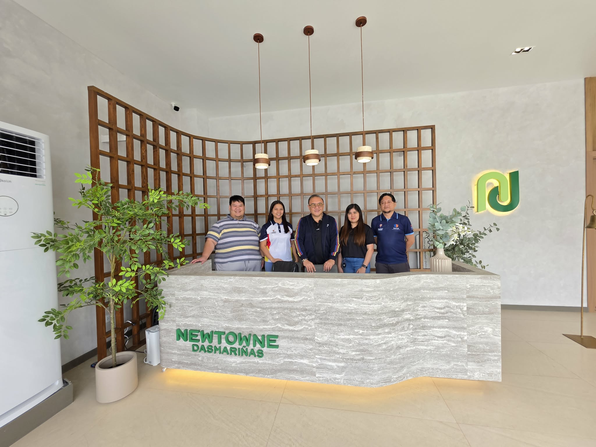 Newtowne Dasmariñas Sales Lounge and Showroom with Filipinohomes CEO Anthony Leuterio(Middle)
