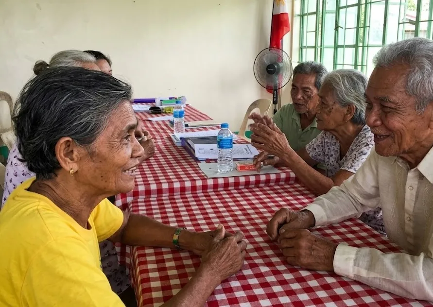 Senior citizens spending time learning from each other.