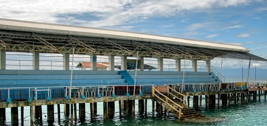 Benches at the aquamarine park where dolphins can be viewed.