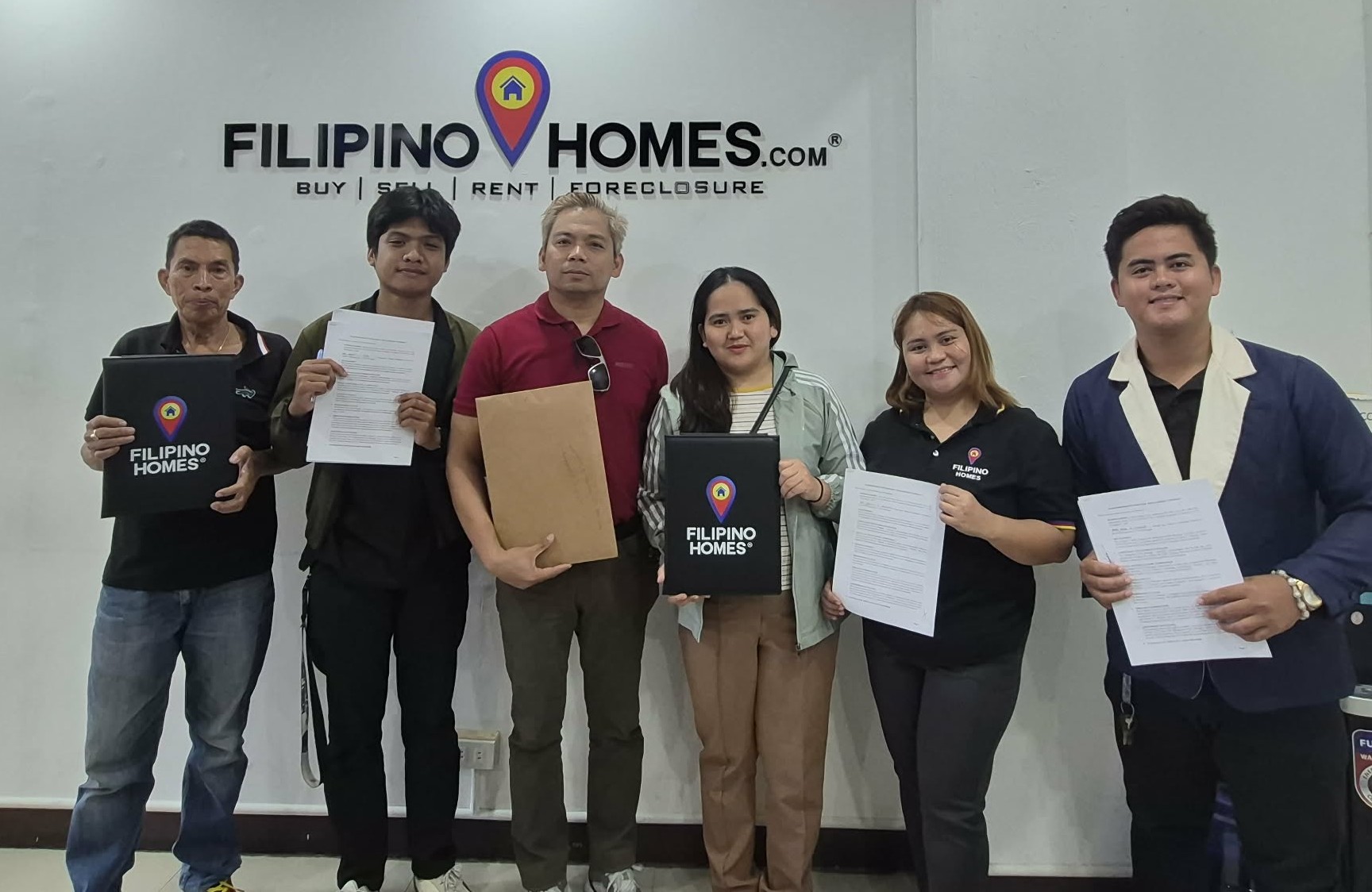 Contract Signing With Team Red Diamonds Adds Third Group to Filipinohomes Dumaguete Roster