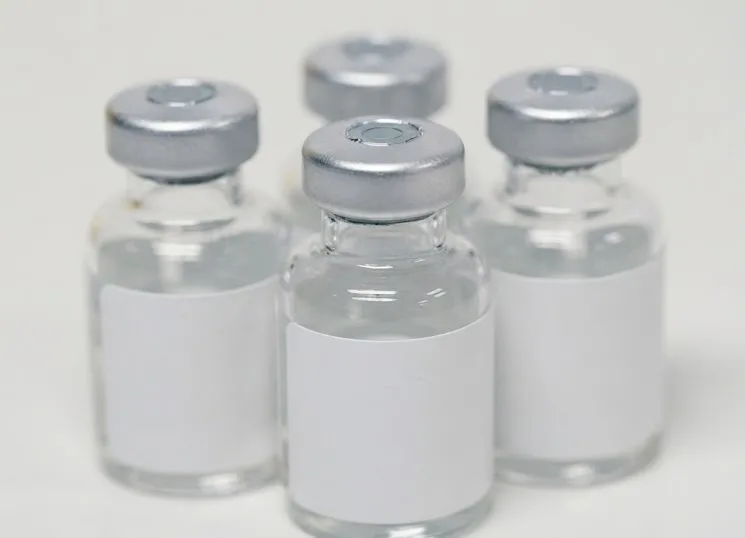 Empty vaccine vials ready to be refilled.