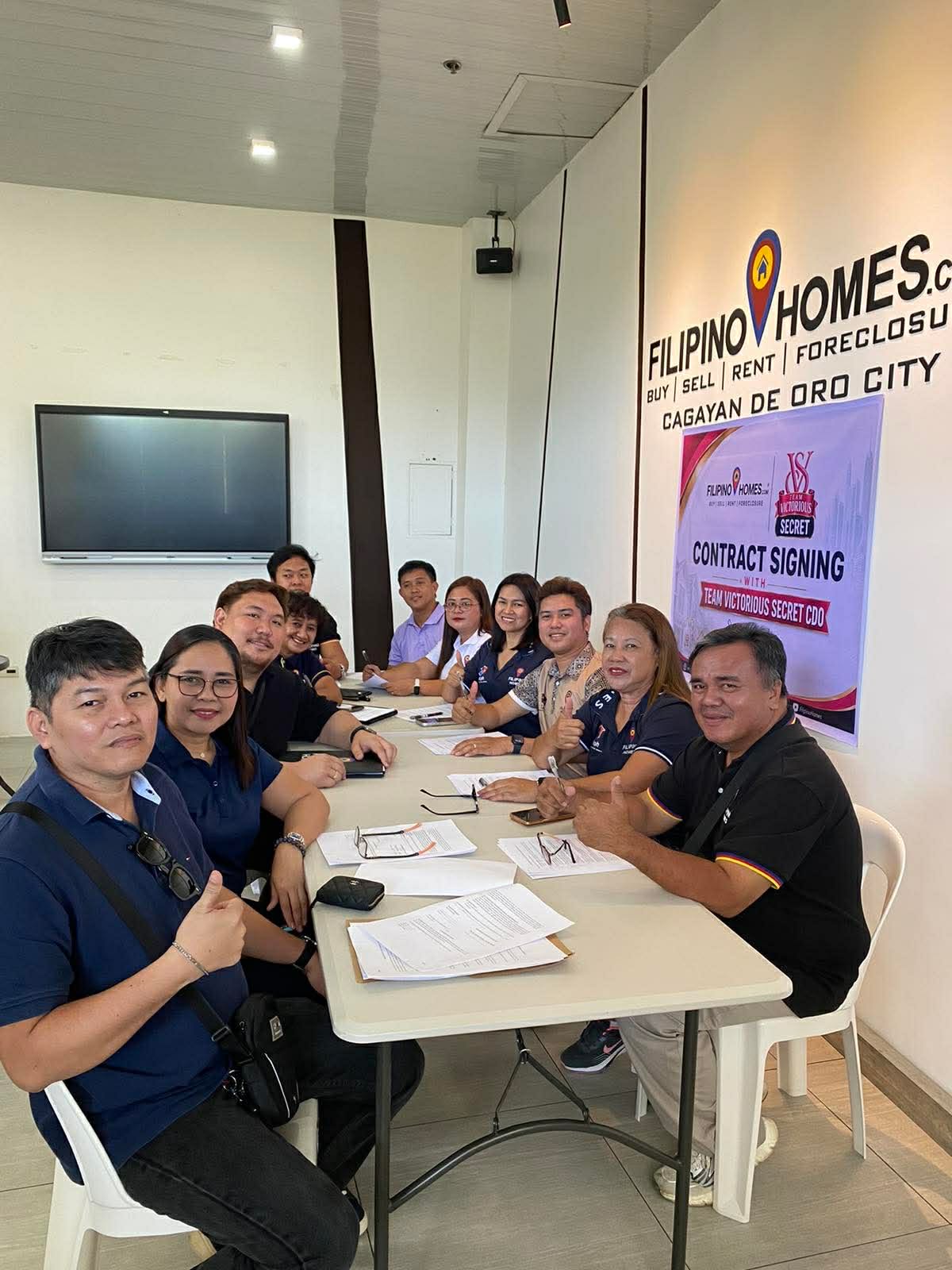 Team Victorious Secret seals contract signing at Filipinohomes Cagayan de Oro office — Philippines