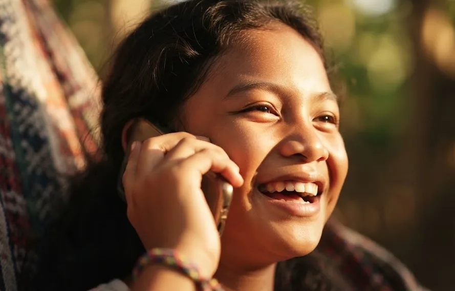 A girl speaking on the phone.