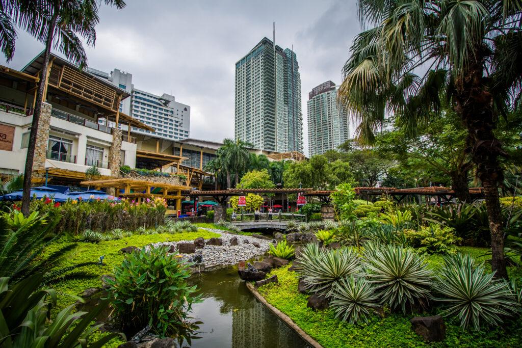 Quiet garden with greenery and shaded paths in BGC